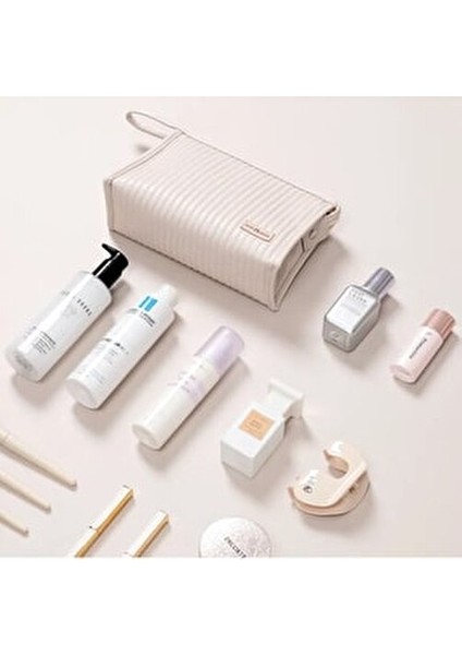 Halley Suni Deri Kapitone Makyaj ve Seyahat Çantası Şık Bej Renkli Tasarım modelleri