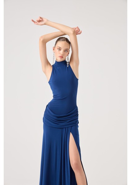 Balıkçı Yaka Yırtmaçlı Uzun Valentina Elbise Mavi fiyatları