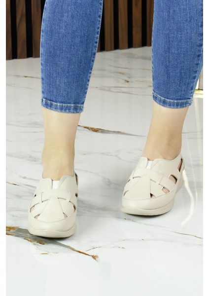 Aida Bej Hakiki Dana Derisi Kesik Detaylı Lastikli Slip-On Günlük Ayakkabı modelleri