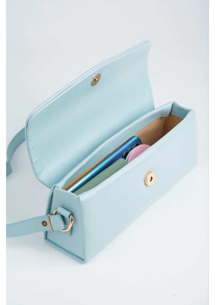 Kadın Gelincik Bebe Mavi Dokulu Suni Deri Astarlı Çıt Çıt Kapama El Kol ve Omuz Çantası indirimleri