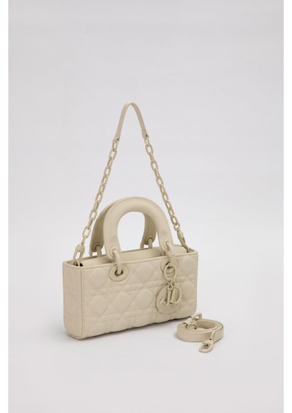 Krem Zincir Aksesuarlı Kapitone El Çantası fiyatları