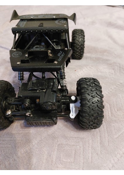 Radyo Kontrollü Bir Makinenin Ön Tekerlek Göbeği. (Plastik Aparattır!!!) 3D fiyatları