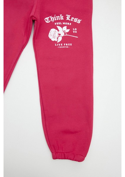 Gül ve Yazı Baskılı Beli Lastikli Kız Çocuk Eşofman Altı fiyatları