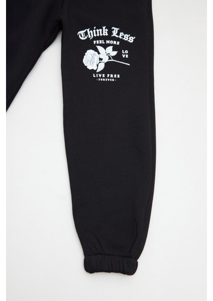 Gül ve Yazı Baskılı Beli Lastikli Kız Çocuk Eşofman Altı fiyatları