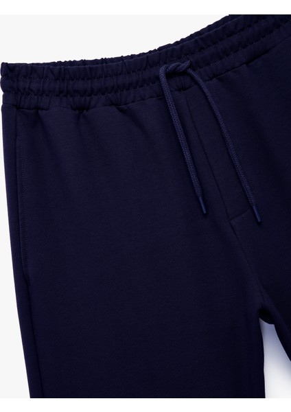 Pamuklu Rahat Kalıp Cep Detaylı Beli Bağcıklı Spor Şort modelleri