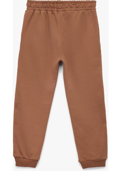 Pamuklu Şardonlu Dikiş Detaylı Cepli Beli Bağcıklı Jogger Eşofman Altı fiyatları