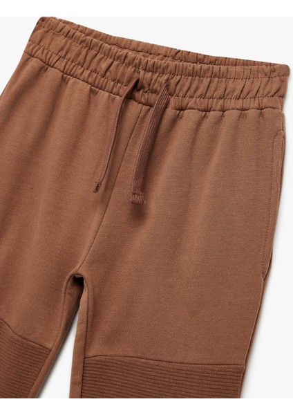 Pamuklu Şardonlu Dikiş Detaylı Cepli Beli Bağcıklı Jogger Eşofman Altı modelleri