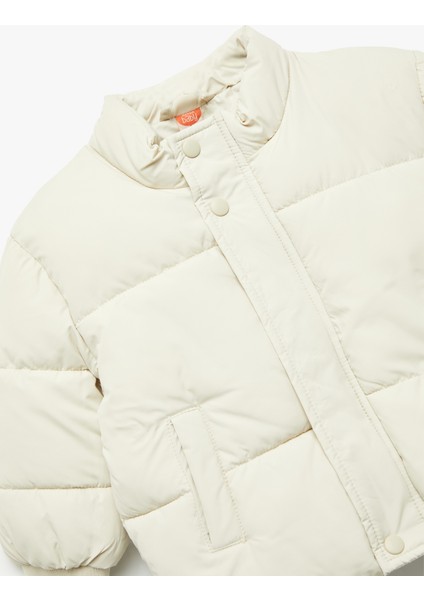 Uzun Kollu Cepli Pamuk Astarlı Dik Yaka Şişme Mont fırsatları