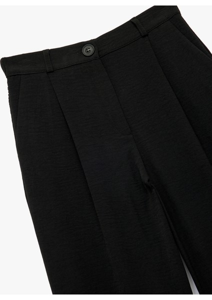 Aerobin Kumaş Pileli Cepli Düşük Bel Bol Paça Pantolon modelleri