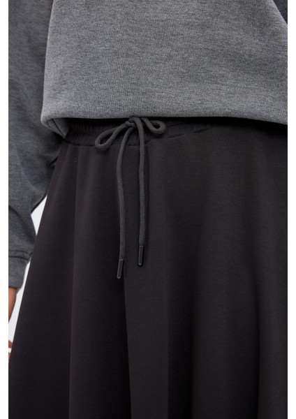 Yüksek Bel Bağcıklı Geniş Form Kloş Etek Siyah modelleri