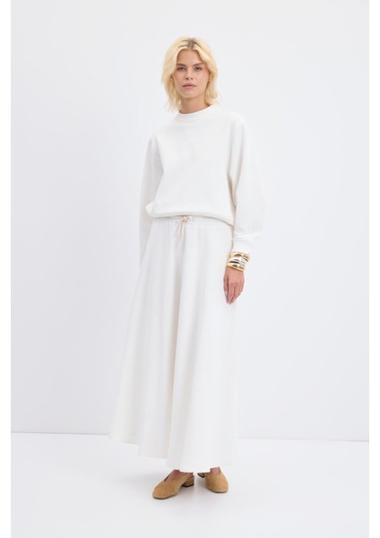 Yüksek Bel Bağcıklı Geniş Form Kloş Etek Ekru fiyatları