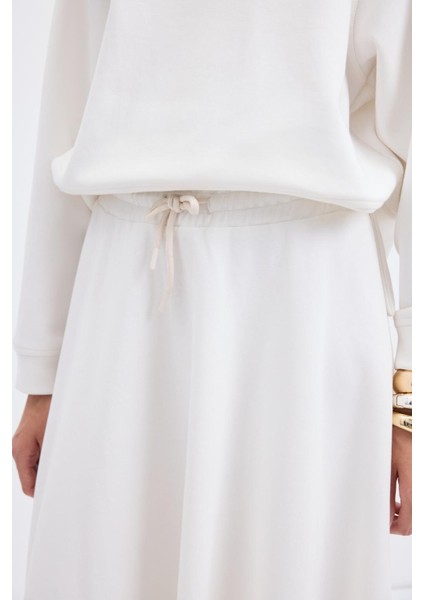 Yüksek Bel Bağcıklı Geniş Form Kloş Etek Ekru fırsatları