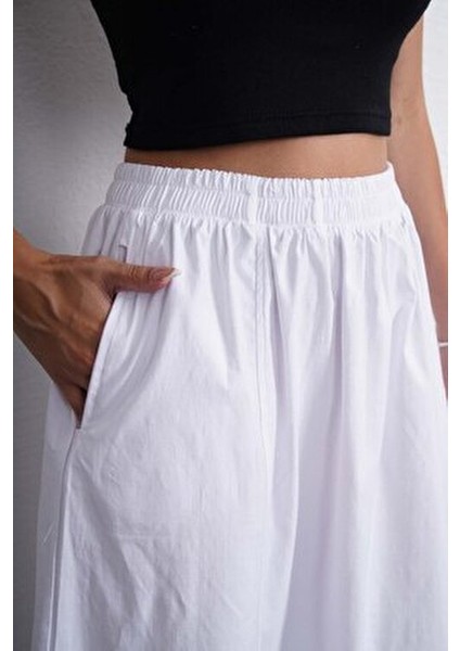 Uzun Beli Lastikli Poplin Kumaş Çift Cepli Rahat Kesim Tesettür Etek Astarsız (Uzunluk 90 Cm) fiyatları