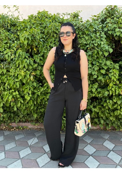 Siyah Beli Lastikli Boncuk Detaylı Bol Pantolon modelleri