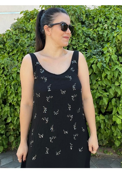 Siyah Sırt Dekolteli Taş Işlemeli Tasarım Elbise modelleri