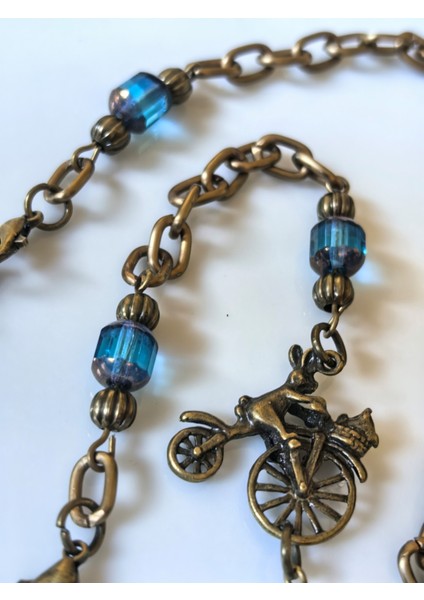 Gözlük Zinciri Unisex Antik Altın Zincirli Turkuaz Gerçek Kristal Taşlı Bisiklet Figürlü Gözlük Askısı fiyatları