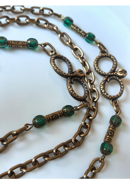 Unisex Gözlük Zinciri – Antik Altın Zincirli, Yeşil Kristal Taşlı, Yılan Başlı Sonsuzluk Figürlü | 78 cm | Thinblack® fiyatları