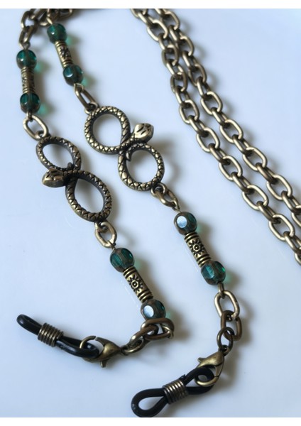 Unisex Gözlük Zinciri – Antik Altın Zincirli, Yeşil Kristal Taşlı, Yılan Başlı Sonsuzluk Figürlü | 78 cm | Thinblack®