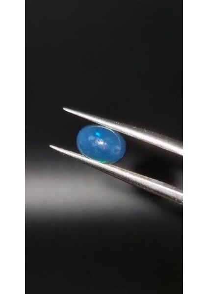 0.79CT 7.9x5.8mm Oval Natural Cabachon Ethiopian Opal
