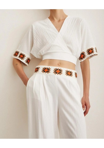Süzene Nakışlı Kruvaze Yaka Kuşaklı Crop Keten Kumaş Takım fiyatları