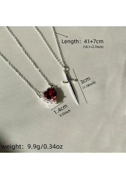 Kararmaz Çelik Kalp Kılıç Kolye ve Kokulu Pembe Lotus Mum Hediye Seti Pamuk Prenses ve Avcı Kolye fırsatları