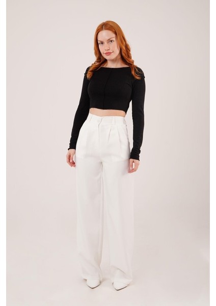 Bol Paça Piliseli Beyaz Pantolon indirimleri
