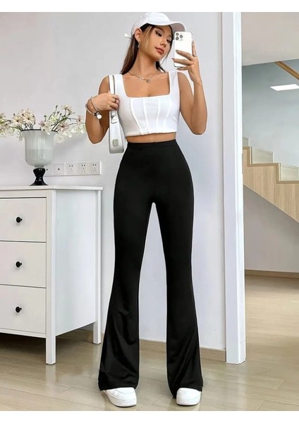Kadın Yüksek Bel Paçaya Doğru Genişleyen Yandan Yırtmaçlı Dalgıç Pantolon fırsatları