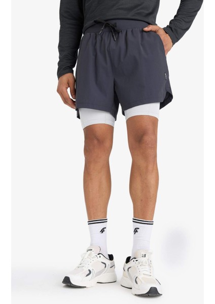 Fit Slim Fit Dar Kesim Sporcu İçi Taytlı Kısa Paça Şort E9365AX25AU fırsatları
