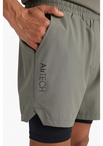 Fit Slim Fit Dar Kesim Sporcu İçi Taytlı Dokuma Şort F0010AX25AU fırsatları