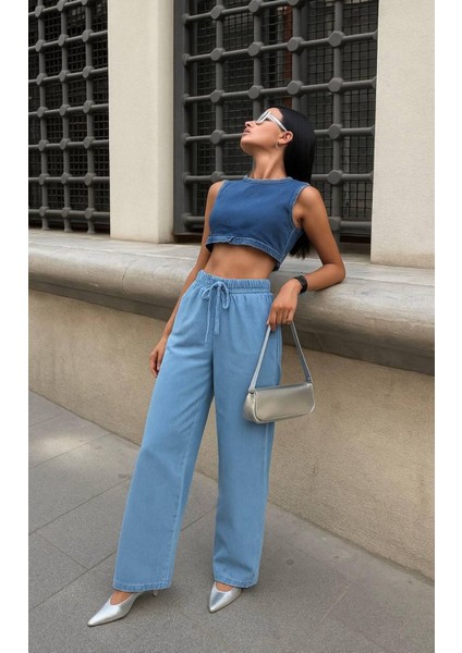 Julia Kadın Buz Mavi Beli Lastikli Bagcıklı Cepli Bol Paça İnce Kumaş Palazzo Kot Pantolon fiyatları