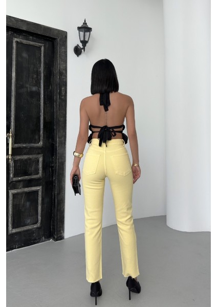 Paçaları Dikişsiz ve Yüksek Belli Kadın Kot Pantolon Mom Fit Jean Açık Sarı fırsatları