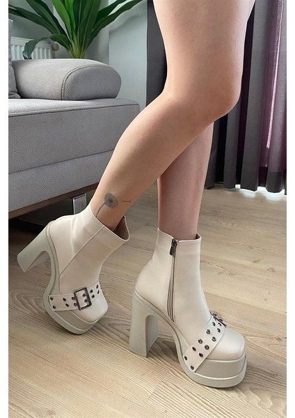 Kadın Krem Cilt Toka Detaylı 12 cm Platform Topuklu Fermuarlı Bot modelleri
