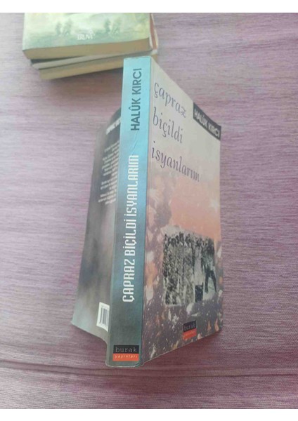 Halûk Kırci'nin "çapraz Biçildi Isyanlarım" Adlı Romanı, Güçlü Anlatımıyla Derin Temaları Işliyor. Capraz Bıcıldı Isyanlarım Haluk Kirci Burak Yayinlari 2003 Basim 288 Sayfa fiyatları