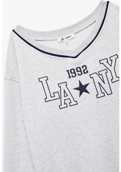 Uzun Kollu V Yaka Biyeli Nakışlı Oversize Sweatshirt modelleri