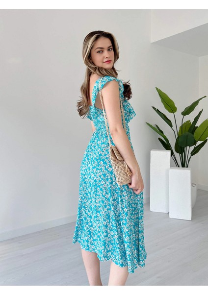 Kare Yaka Çiçek Desen Sırtı Gipeli Beli Lastikli ve Bağcıklı Midi Boy Viskon Elbise indirimleri