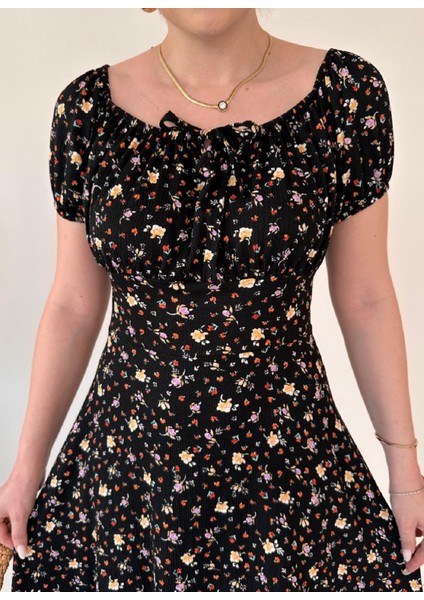 Kayık Yaka Önü Bağlamalı Çiçek Desenli Göğüs Büzgülü Bürümcük Midi Elbise fiyatları