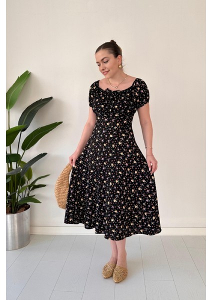 Kayık Yaka Önü Bağlamalı Çiçek Desenli Göğüs Büzgülü Bürümcük Midi Elbise indirimleri