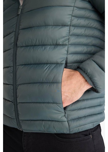 Su İtici Slim Fit Dar Kesim İç Cep Detaylı Kapüşonlu Fermuarlı Cepli Şişme Mont N4661AZ25AU indirimleri