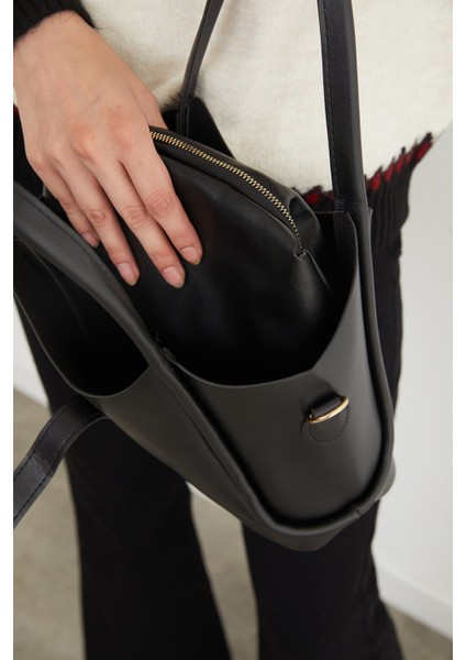 Suni Deri Fermuarlı Yavrulu Kol Çantası fırsatları