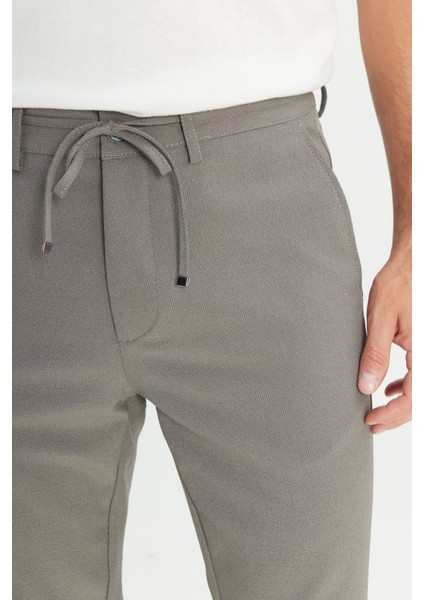 Slim Fit Dar Kesim Beli Bağlamalı Çizgili Yan Cepli Casual Jogger Pantolon fırsatları