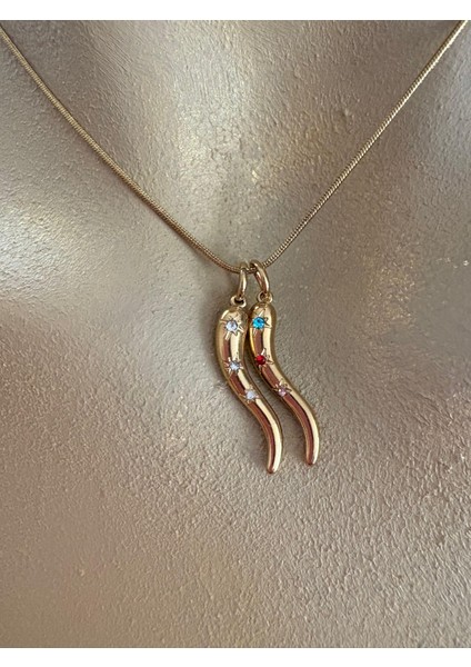 Çelik Biber Ikili Figürlü Kolye fırsatları