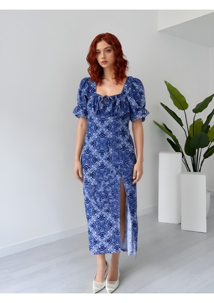 Kare Yaka Prenses Kol Dar Kalıp Likralı Yırtmaçlı Uzun Bürümcük Elbise fiyatları