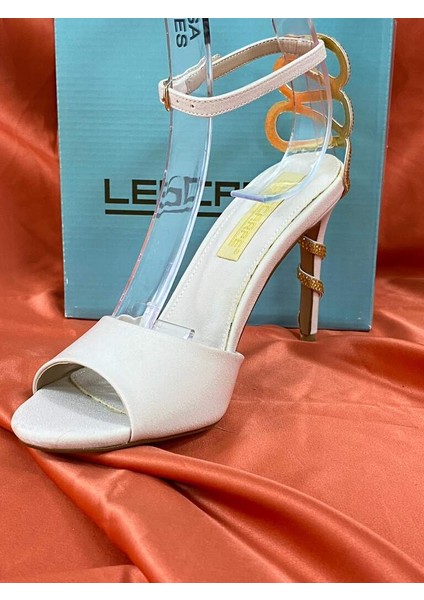 LES024 Bej (Krem) Bilekten Bağlamalı Yılan Topuk Detaylı Yüksek Ince Topuklu Ayakkabı Stiletto fırsatları