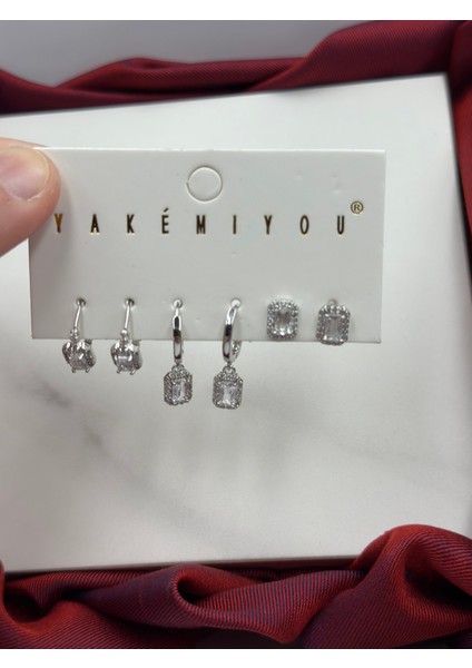 6'lı Baget Tektaşlı Pırlanta Işçiliği Tasarım Zirkon Taşlı Marka Model Çelik Küpe