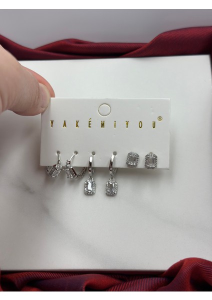 6'lı Baget Tektaşlı Pırlanta Işçiliği Tasarım Zirkon Taşlı Marka Model Çelik Küpe fiyatları