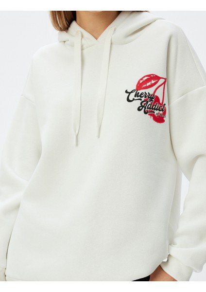 Oversize Kapüşonlu Sweatshirt Arkası Meyve Baskılı Şardonlu indirimleri