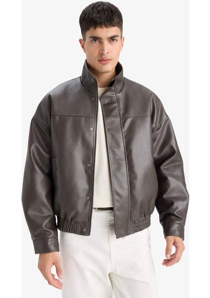 Su Geçirmez Oversize Geniş Kalıp Dik Yaka İç Cepli Çıtçıtlı Beli Lastikli Deri Ceket Mont D2427AX25AU modelleri