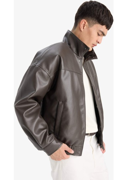 Su İtici Oversize Fit Geniş Kalıp Dik Yaka İç Cepli Çıtçıt Kapamalı Beli Lastikli Deri Ceket Mont D2427AX25AU fırsatları