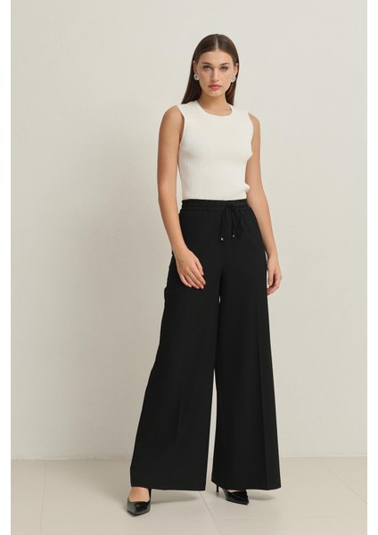 Siyah Belden Lastikli Rahat Kesim Geniş Paça Pantolon fiyatları