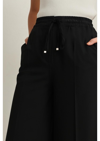 Siyah Belden Lastikli Rahat Kesim Geniş Paça Pantolon modelleri
